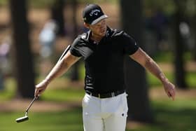 Danny Willet, of England, reacts after his putt on the seventh hole during the final round at the Masters golf tournament on Sunday, April 10. (AP Photo/David J. Phillip)