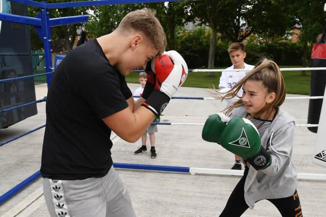 A visit by the Jimmy Coyle Box Clever Bus to Bridlington Rugby Club.
Lydia Middleton, 12, in the ring with a coach. Picture: Paul Atkinson.