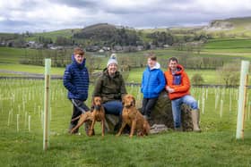 Richard and Kath Hinds with sons Oliver and William at Woodhouse Farm near the village of Austwick in the Yorkshire Dales National Park who have planted nearly 5000 native broadleaved shrubs and trees in a five hectare (12 acre) field.