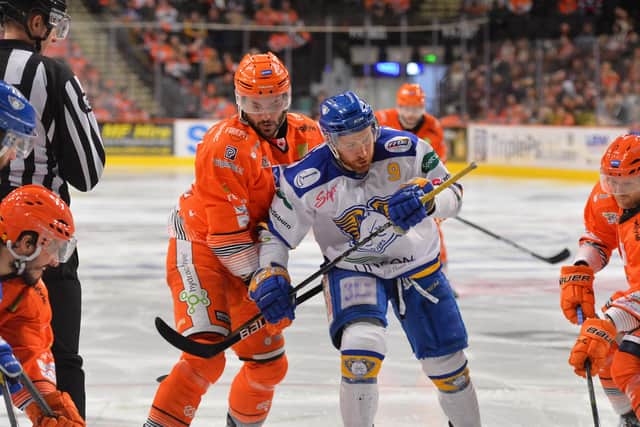 Justin Hodgman (left) in action against Fife Flyers earlier this season. Picture: Dean Woolley.