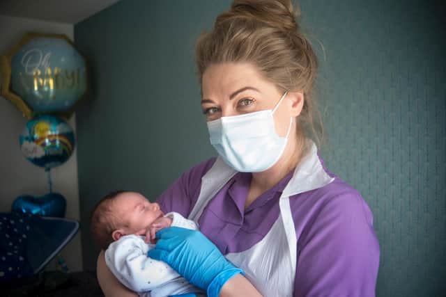 Midwife Laura Hughes. Photo by Tim Smith for Candour Productions