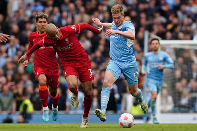 Liverpool's Fabinho (left) and Manchester City's Kevin De Bruyne battle for the ball during their Premier League clash at the Etihad Stadium on Sunday Picture: Martin Rickett/PA