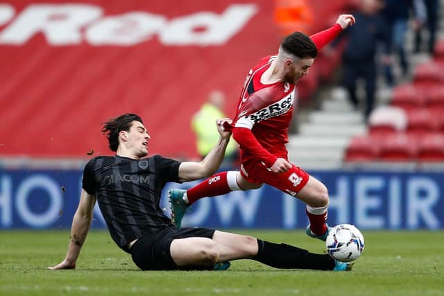 Middlesbrough's Aaron Connolly and Hull City's Jacob Greaves in action during the Sky Bet Championship match at the Riverside Stadium (Picture: PA)
