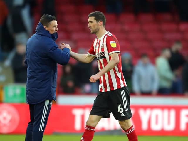 Decision time: Chris Basham, right, is in negotiations over a new deal at Bramall Lane and was back in training this week. (Picture: SportImage)