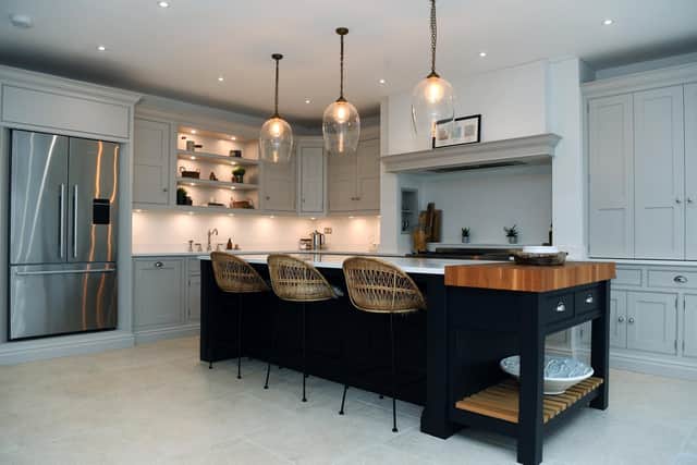 The kitchen with cabinets from Tom Howley, Harrogate, and light above from Jim Lawrence.