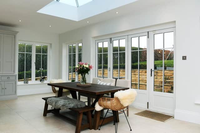 The glazed extension has added space and light in the open plan living kitchen