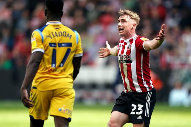 Sheffield United's Ben Osborn (right) reacts during the Sky Bet Championship match at Bramall Lane (Picture: PA)