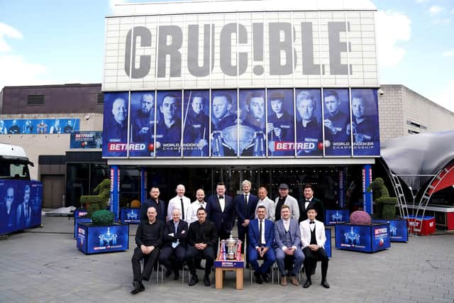 (Back to front, left to right) Mark Allen, Anthony McGill, Luca Brecel, Shaun Murphy, Neil Robertson, Barry Hawkins, Stuart Bingham, Yan Bingtao, Mark Williams, John Higgins, Ronnie O'Sullivan, Mark Selby, Kyren Wilson and Zhao Xinong during the media day at the Crucible. Photo: Zac Goodwin/PA Wire.