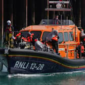 A group of people thought to be migrants are brought in to Dover, Kent, by the RNLI, following a small boat incident in the Channel