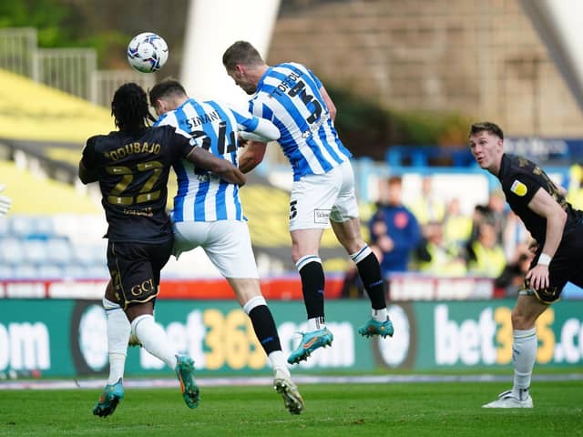 GOALSCORER: Harry Toffolo heads Huddersfield Town back in front a second time