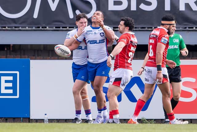 Reece Lyne celebrates his try against Salford Red Devils. (Picture: SWPix.com)