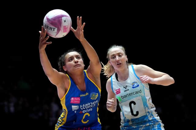 Imogen Allison of Team Bath, left, and Jade Clarke of Leeds Rhinos in action today. Picture: Chloe Knott/Getty Images.