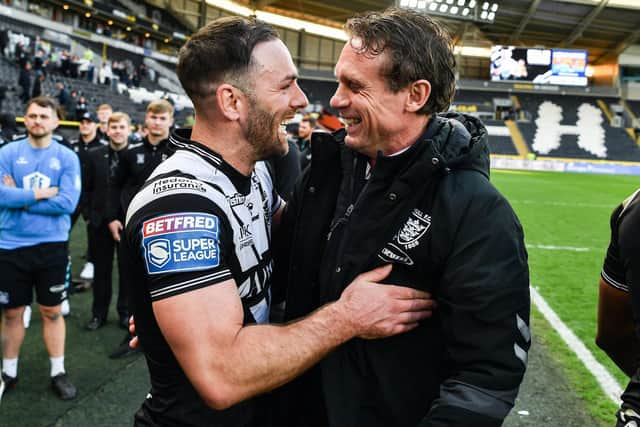 All smiles: Hull coach Brett Hodgson and captain Luke Gale celebrate after their win over Warrington. Picture: Will Palmer/SWpix.com