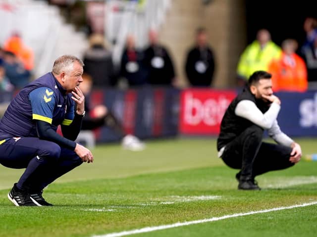 MUCH TO PONDER: Chris Wilder (foreground) during Middlesbrough's game against Huddersfield Town