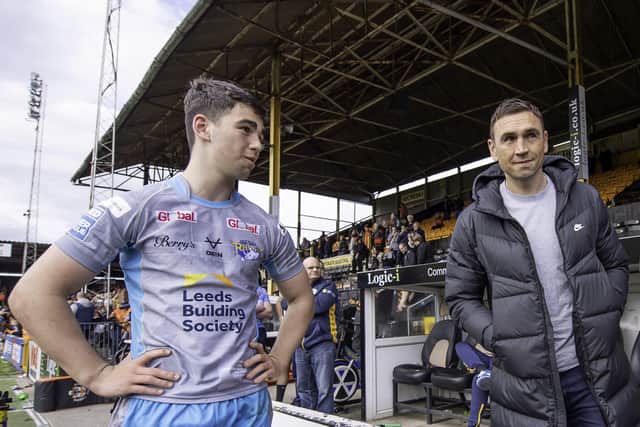 Looks familiar: Jack Sinfield, left, son of Leeds all-time great Kevin, right, made his Rhinos debut in the defeat by Castleford. Picture:AllanMcKenzie/SWPix