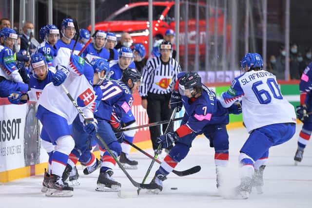 GB's players mix it with Slovakia at last year's World Championships in Latvia. Picture: Dean Woolley.