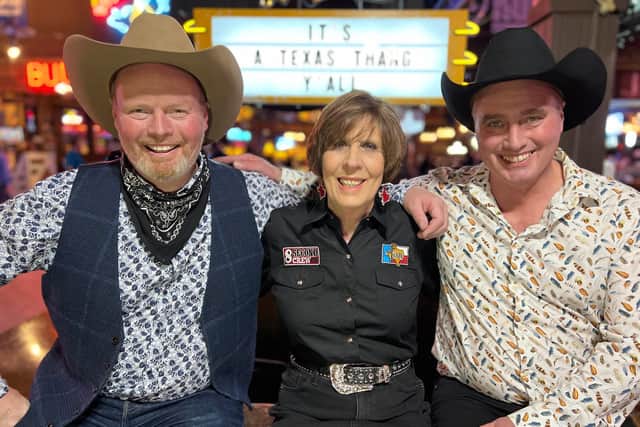 Presenters Rob and Dave Nicholson and Rhonda at Billy Bobs during their Line dancing session.
