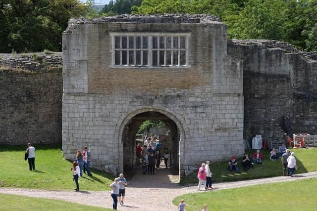 Access is across a moat and via the barbican and gatehouse