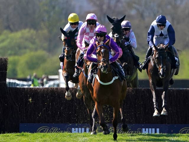 Dreams of Home ridden by jockey Brian Hughes (centre) on their way to winning the Bob Nelson Capercaillie Handicap Chase and his 200th season win at Perth. Picture: Jane Barlow/PA