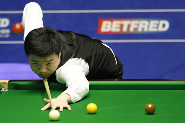Ding Junhui  in action against Kyren Wilson on Wednesday at the Crucible. Picture: Richard Sellers/PA