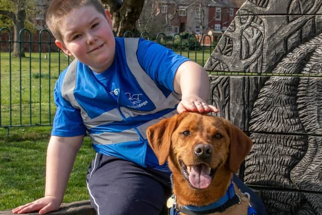 Jacob Brailsford with his assistance dog Jai Jayy. Photo: Support Dogs