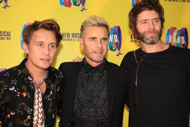 (left-right) Mark Owen, Gary Barlow, and Howard Donald of Take That. Picture: Peter Byrne/PA Wire