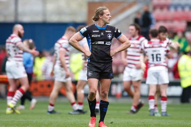 Jacob Miller looks dejected after Wakefield's defeat at Wigan. (Picture: SWPix.com)