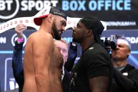 TITLE FIGHT: Tyson Fury (left) and Dillian Whyte face off during the weigh in at BOXPARK Wembley. Picture: PA Wire.