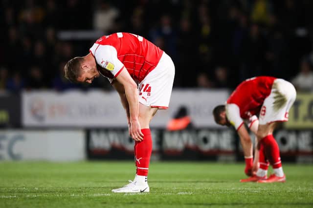 Rotherham United's Michael Smith (left) appears dejected at the Pirelli Stadium, after defeat to Burton Albion Picture: Isaac Parkin/PA