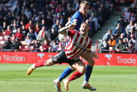 PENALTY APPEAL: Mark McGuinness's challenge on Sheffield United's Billy Sharp was not punished
