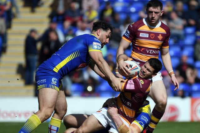 Jack Cogger takes the ball in against Warrington. (Picture: SWPix.com)