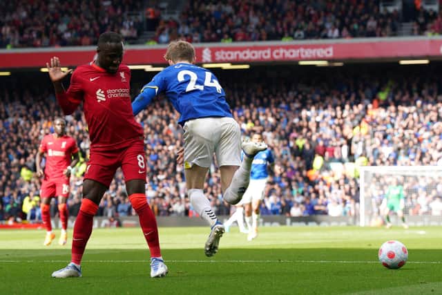 BOOKED: Everton's Anthony Gordon goes over in the penalty area resulting in a yellow card for simulation during the Premier League match at Anfield, Liverpool. Picture: PA Wire.