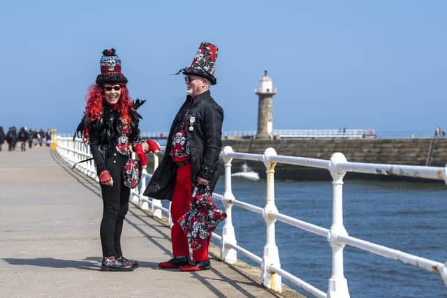 Ian and Trish Hainsworth from Bradford on the West Pier at Whitby in their Goth weekend outfits. Picture Tony Johnson