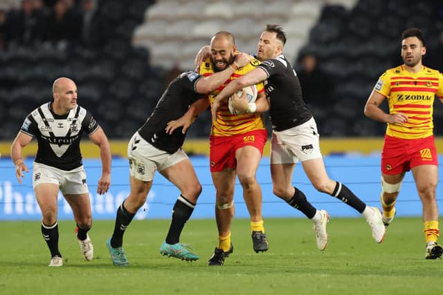 Hull FC get to grips with Sam Kasiano. (Picture: SWPix.com)