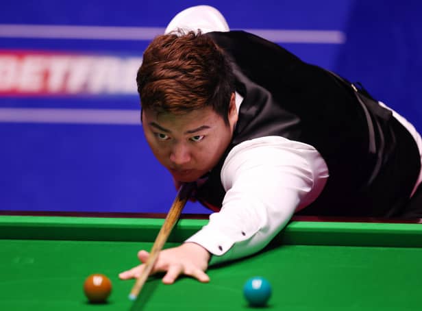 Yan Bingtao has reached the Betfred World Championship quarter-finals. (Photo by George Wood/Getty Images)