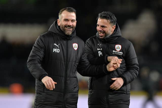 Poya Asbaghi celebrates at full-ttimewith Martin Devaney after the win at Hull City. Devaney has now temporarily succeeded Asbaghi as Barnsley boss (Picture: Bruce Rollinson)
