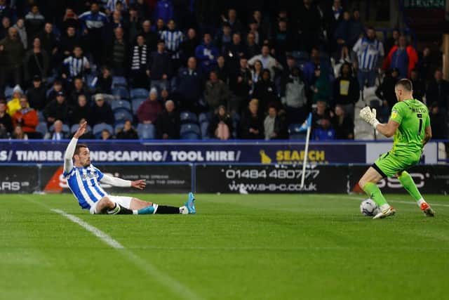 FINISH: Harry Toffolo scored for Huddersfield Town as they beat Barnsley on Friday night. Picture: Getty Images.