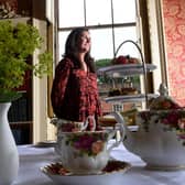 Wentworth Woodhouse has appealed for help to source new china after an 'unfortunate incident' means the old china cannot be used. Pictured is Paula Kaye with the Afternoon Tea in 2021, taken by Simon Hulme.