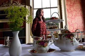 Wentworth Woodhouse has appealed for help to source new china after an 'unfortunate incident' means the old china cannot be used. Pictured is Paula Kaye with the Afternoon Tea in 2021, taken by Simon Hulme.