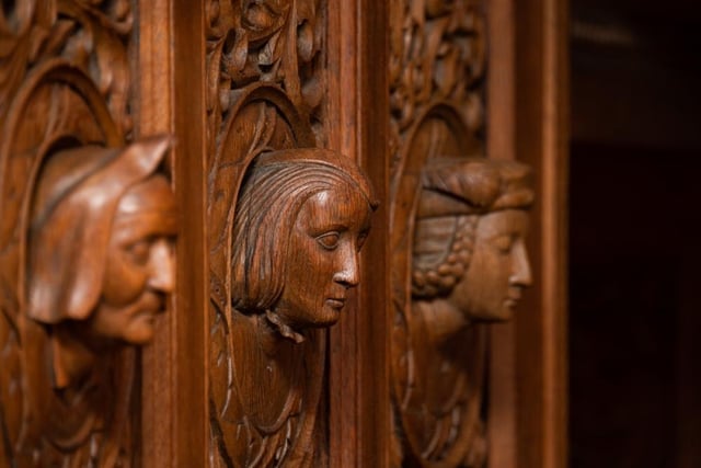 The intricate hand carvings are a reminder of the care and craftsmanship that went into creating this property