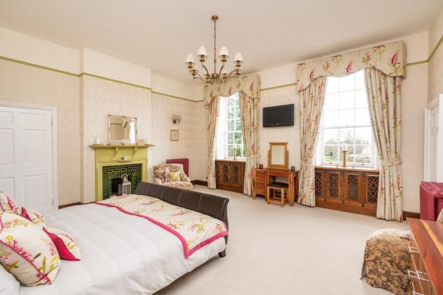 One of the six liight-filled bedrooms in the property