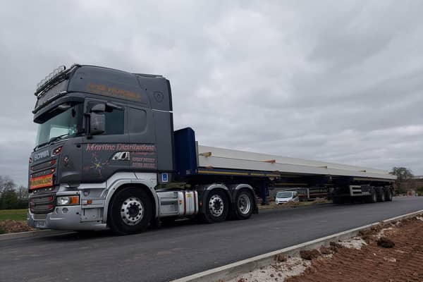 Two huge steel beams are being transported to South Yorkshire