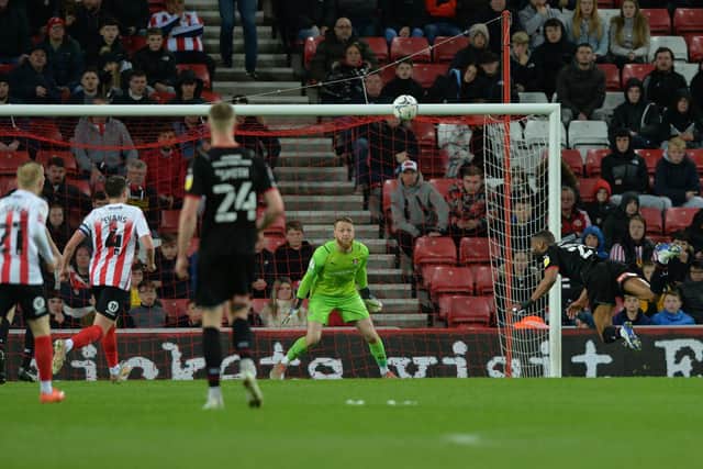 Michael Ihiekwe heads into his own goal for Sunderland's equaliser on Tuesday night.  Picture: Bruce Rollinson
