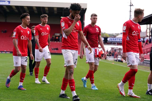 Barnsley's players have been fighting a losing battle all season to avoid relegation from the Championship Picture: Martin Rickett/PA