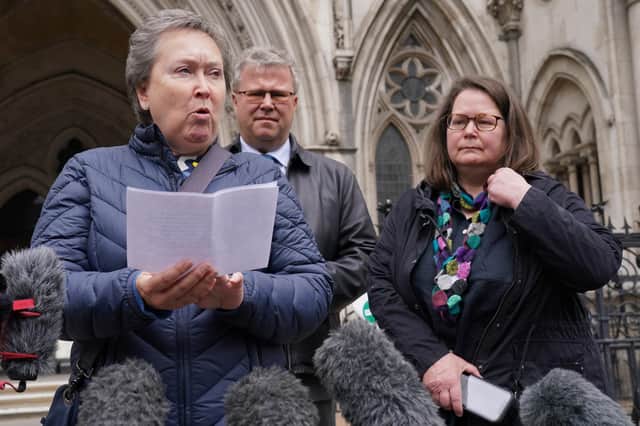 Cathy Gardner (left) and Fay Harris, whose fathers died from Covid-19, speaking outside the Royal Courts of Justice (PA)