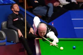 John Higgins in action against Jack Lisowski in their World Championship quarter-final in Sheffield. Picture: PA