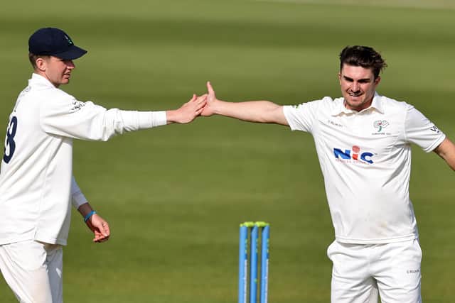 Jordan Thompson  (R) of Yorkshire celebrates with team mate George Hill after taking the wicket of Ben Sanderson during the LV= Insurance County Championship match between Northamptonshire and Yorkshire at The County Ground on April 22, 2022 in Northampton, England. (Picture: David Rogers/Getty Images)