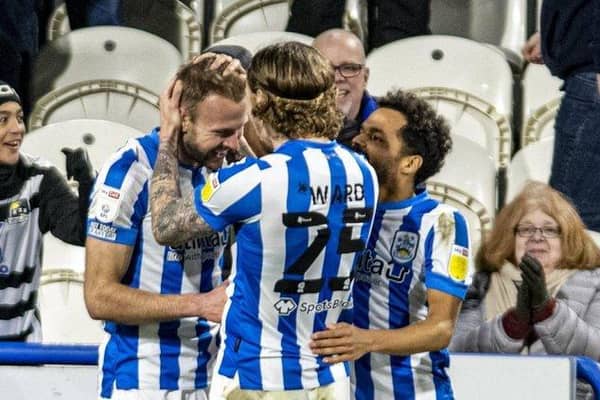 Jordan Rhodes pictured being congratulated by Danny Ward after scoring Huddersfield Town's second goal against Derby earlier this year. Picture: Tony Johnson.