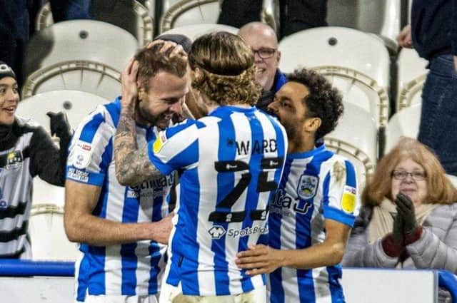 Jordan Rhodes pictured being congratulated by Danny Ward after scoring Huddersfield Town's second goal against Derby earlier this year. Picture: Tony Johnson.