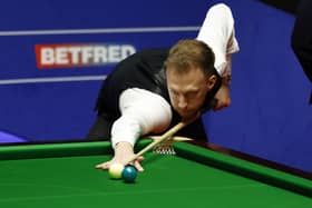 Judd Trump in action at the Betfred World Championship. Picture: PA.